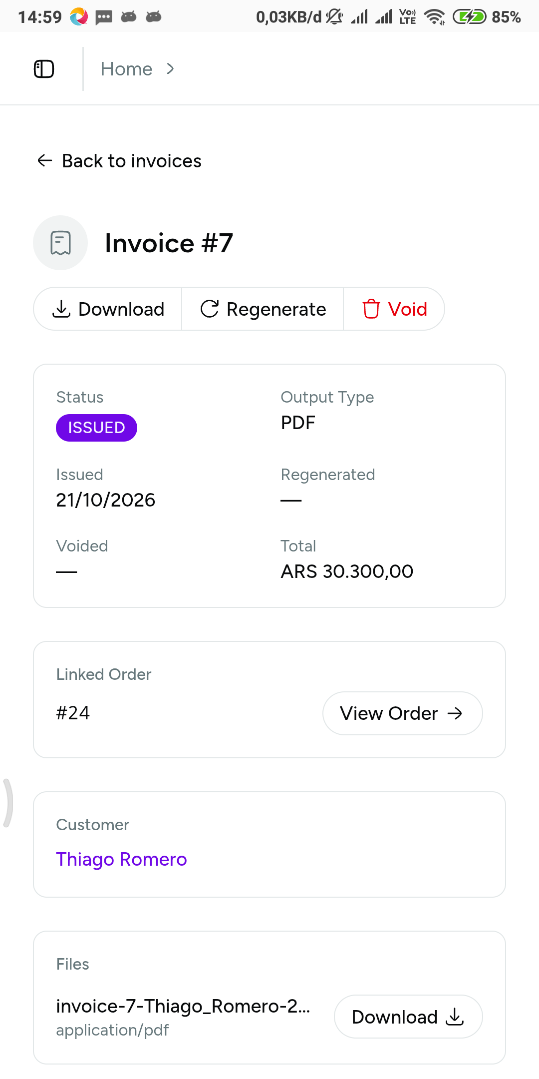 An invoice detail page showing invoice number, linked order and customer, total, and Issued status beside its downloadable PDF file